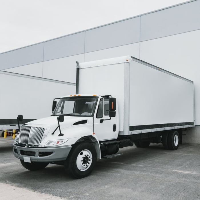 Truck parked in loading dock