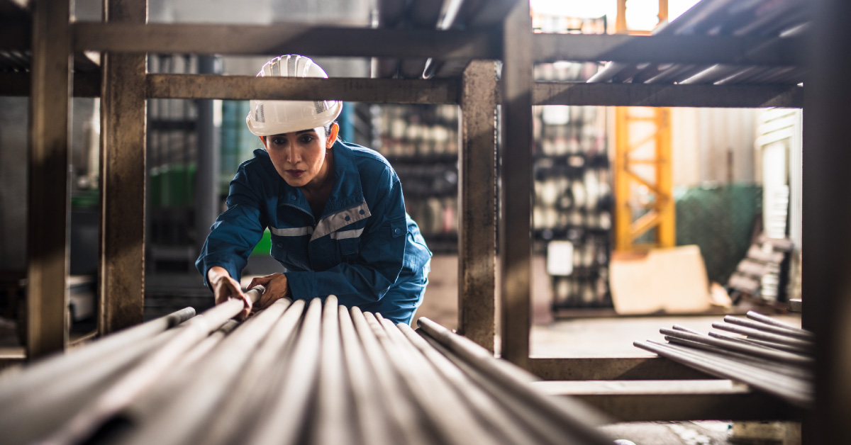 woman working in steel manufacturing plant