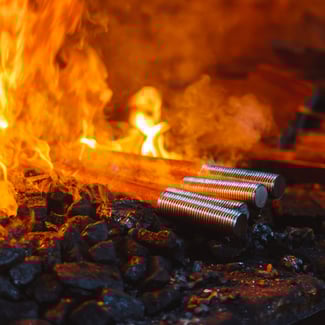 Metal rods on fire 