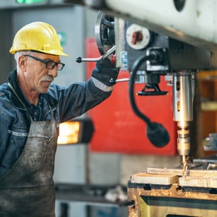 Man working in a metal manufacturing plant