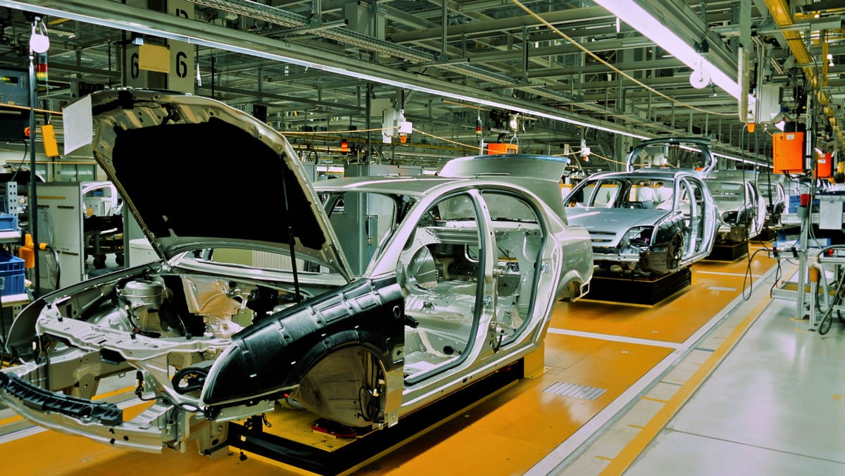 Car manufacturing plant with car frames