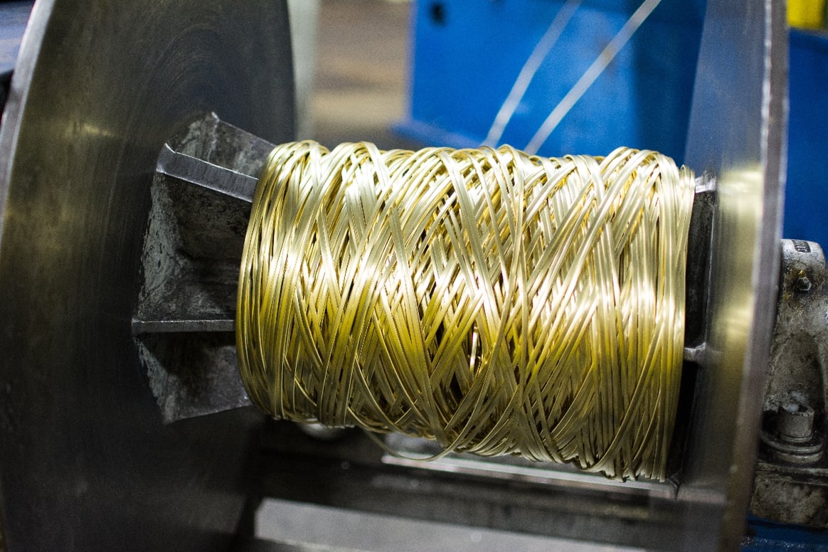 Brass trimmings rolled into a spool