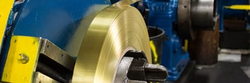 Roll of brass on a Mead Metal's machine